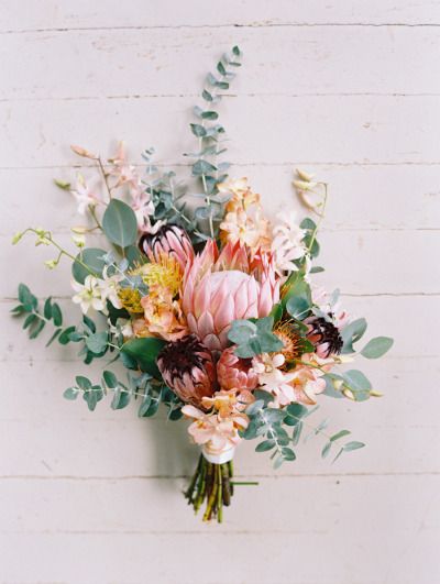 Can you believe this bouquet is from Whole Foods!? http://www.stylemepretty.com/destination-weddings/2015/03/11/diy-maui-wedding-at-olowalu-plantation-house/ | Photography: Wendy Laurel - http://www.wendylaurel.com/: 