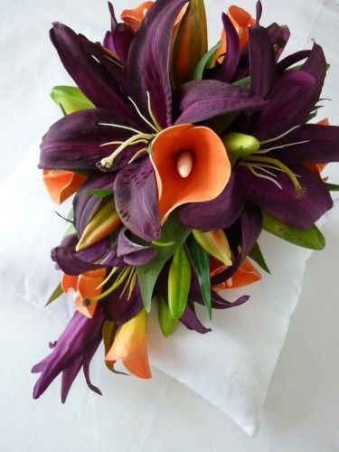 purple casablanca lily's, and orange cala lily's... Maybe I do like jewel tones!!! I need to choose!!!: 