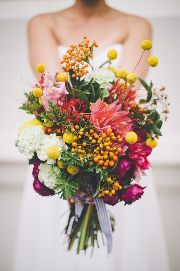 Planning a rustic or whimsical-inspired wedding? Check out this Craspedia wedding flower inspiration for ways to add this quirky flower to your decor.: 